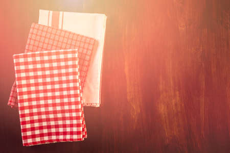 Dish towel on a wood background.の写真素材