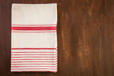 Dish towel on a wood background.の写真素材