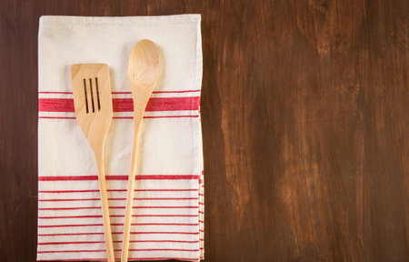 Dish towel on a wood background.の写真素材
