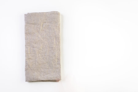 Linen dinner napkins on a white background.の写真素材