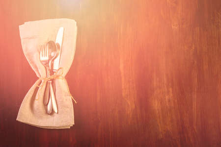 Linen dinner napkins on a wood background.の写真素材