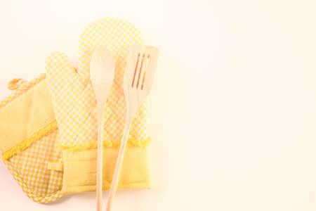 Yellow oven mitt on a white background.の写真素材