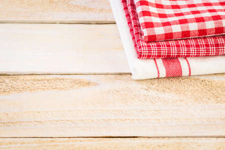 Dish towel on a wood background.の写真素材