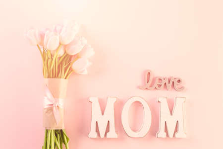 Bouquet of pink tulips on a pink background.の写真素材
