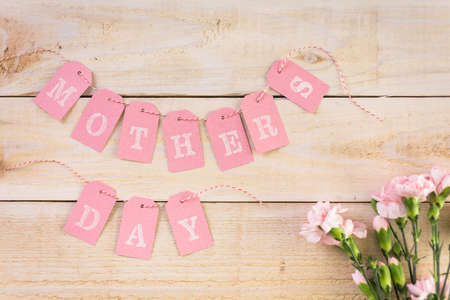 Decorations for Mother's Day on a  wood board.の写真素材