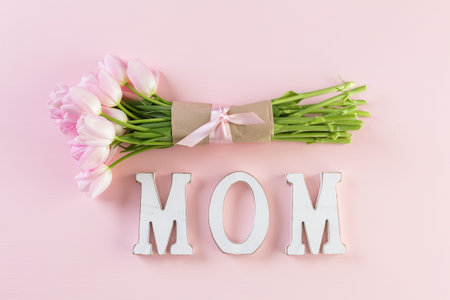 Bouquet of pink tulips on a pink background.の写真素材