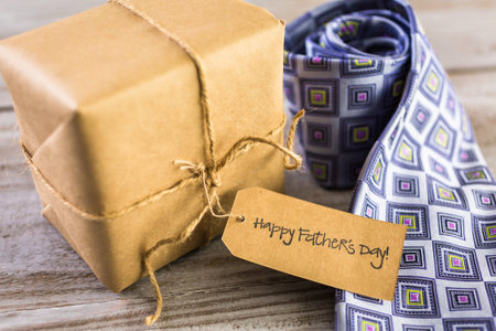 Wrapped in brown paper gift for Father's Day.の写真素材