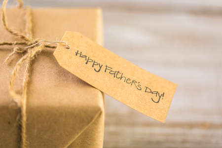 Wrapped in brown paper gift for Father's Day.の写真素材