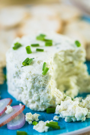 Soft flavored creamy cheese with shallot and chive.の写真素材
