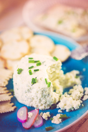 Soft flavored creamy cheese with shallot and chive.の写真素材