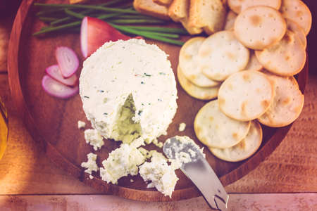 Soft flavored creamy cheese with shallot and chive.の写真素材