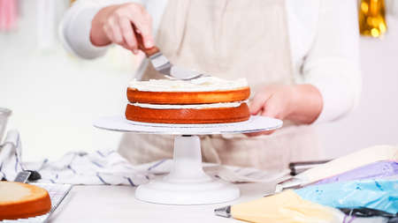 Step by step. Pastry chef making unicorn cake for little girl birthday party.の写真素材