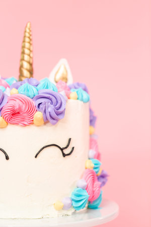 Unicorn cake decorated with multicolor buttercream icing.の写真素材