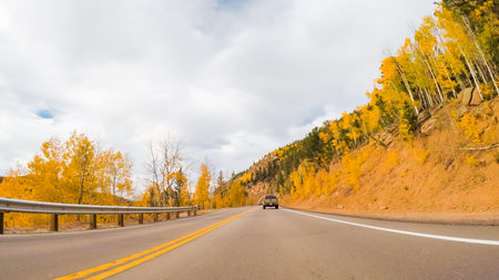 Driving on mountain highway 67 to Colorado Springs in Autumn.の写真素材