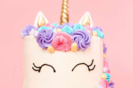 Unicorn cake decorated with multicolor buttercream icing.の写真素材