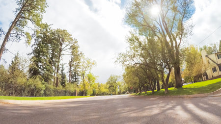 Driving through upscale residential neighborhood of Colorado Springs in Autumn.