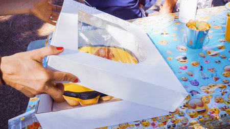 Emoji birthday cupcake cake at the little boy birthday outdoor party.の写真素材