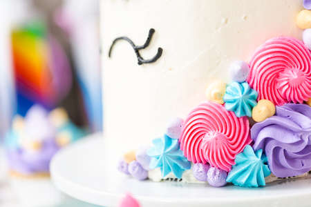 Close up of unicorn cake at little girl birthday party.の写真素材