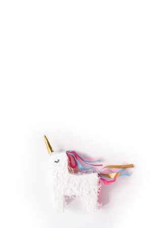 Small unicorn pinata on a white background.の写真素材