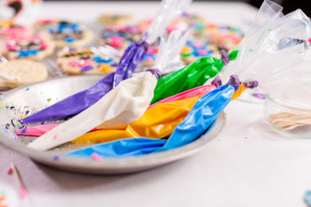 Piping bag with different color of royal icing.