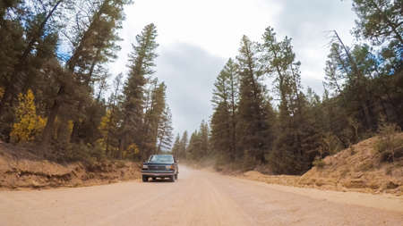 Colorado Springs, Colorado, USA-October 6, 2018 - Driving on small mountain dirt roads from Colorado Springs to Cripple Creek in Autumn.のeditorial素材