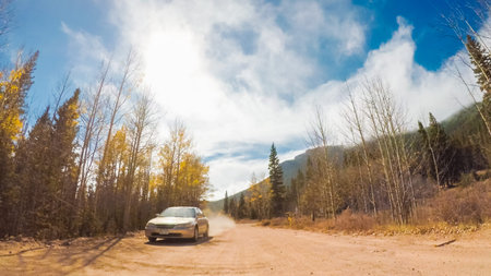 Colorado Springs, Colorado, USA-October 6, 2018 - Driving on small mountain dirt roads from Colorado...