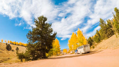 Colorado Springs, Colorado, USA-October 6, 2018 - Driving on small mountain dirt roads from Colorado Springs to Cripple Creek in Autumn.のeditorial素材