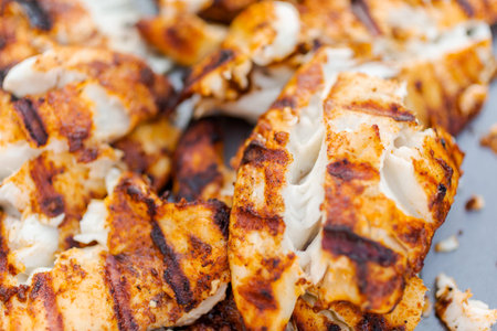 Grilling cod for fish tacos on outdoor gas grill.