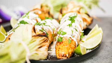 Making Mexican corn on the cob Elote.