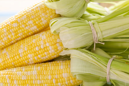 Fresh ingredients for preparing grilling mexican street corn elote.