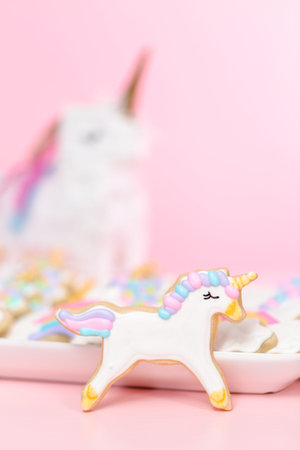 Unicorn sugar cookies decorated with royal icing at the kids birthday party.の写真素材