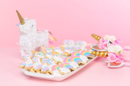 Unicorn sugar cookies decorated with royal icing at the kids birthday party.