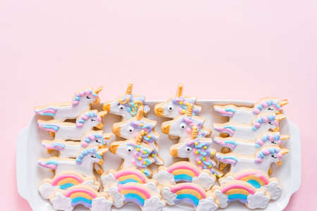 Unicorn sugar cookies on a white serving plate at the kids birthday party.の写真素材
