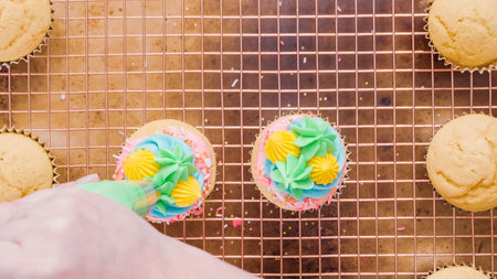 Step by step. Decorating unicorn themed vanilla cupcakes with rainbow buttercream frosting.