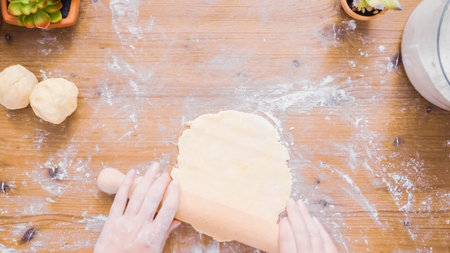 Step by step. Rolling dough for home made empanadas.