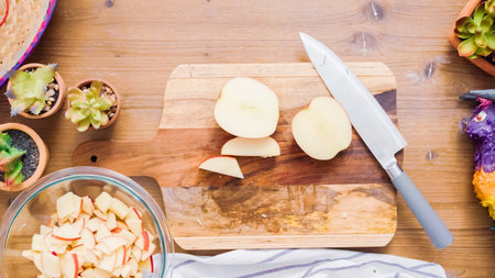 Step by step. Slicing vegetables for filling to make empanadas.