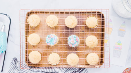 Step by step. Decorating unicorn themed vanilla cupcakes with rainbow buttercream frosting.