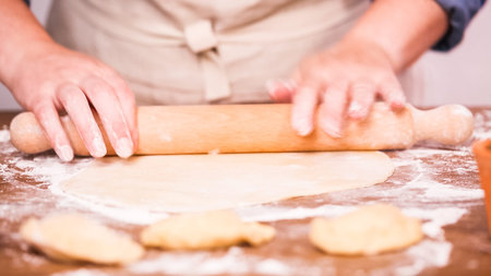 Step by step. Rolling dough for home made empanadas.