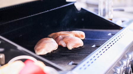 Step by step. Grilling vegetables to make filling for empanadas.