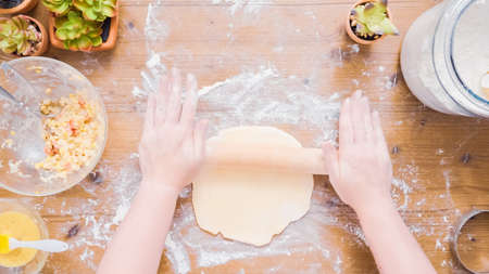 Step by step. Rolling dough for home made empanadas.の写真素材