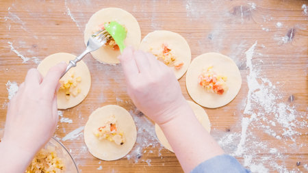 Step by step. Making home made empanadas with different fillings.