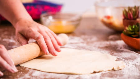 Step by step. Rolling dough for home made empanadas.の写真素材