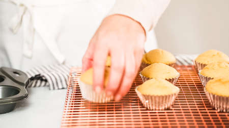 Step by step. Freshly bakes vanilla cupcakes.の写真素材