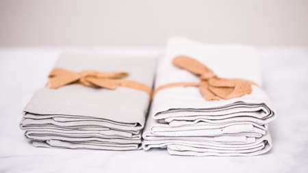 New linen dinner napkin on marble countertop.の写真素材