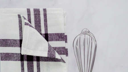 Folding Blck and white patterned paper towels on marble surface.の写真素材