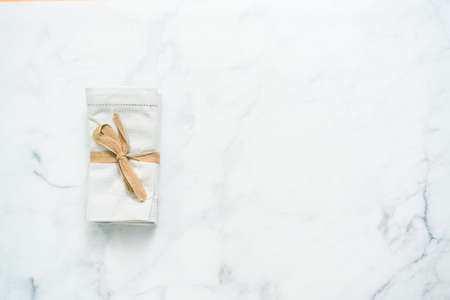 Stack of new linen dinner napkin on the kitchen counter.の写真素材
