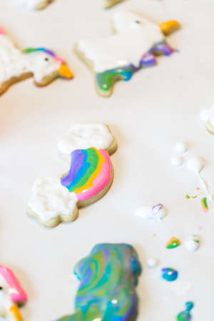 Little girls making unicorn cookies at the play date.の写真素材