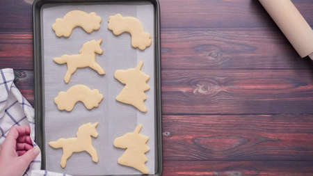 Unicorn shaped sugar cookies on baking sheet.の写真素材