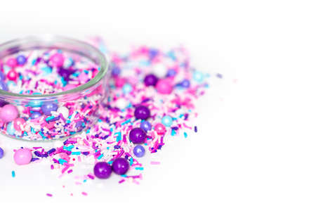 Colorful purple sprinkle blend on a white background.の写真素材