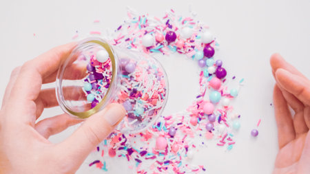 Colorful purple sprinkle blend on a white background.の写真素材